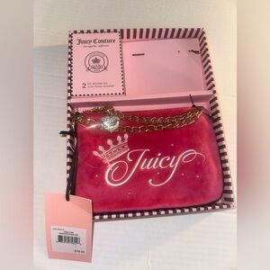 Juicy couture wristlet new in box! The wallet is missing but amazing color